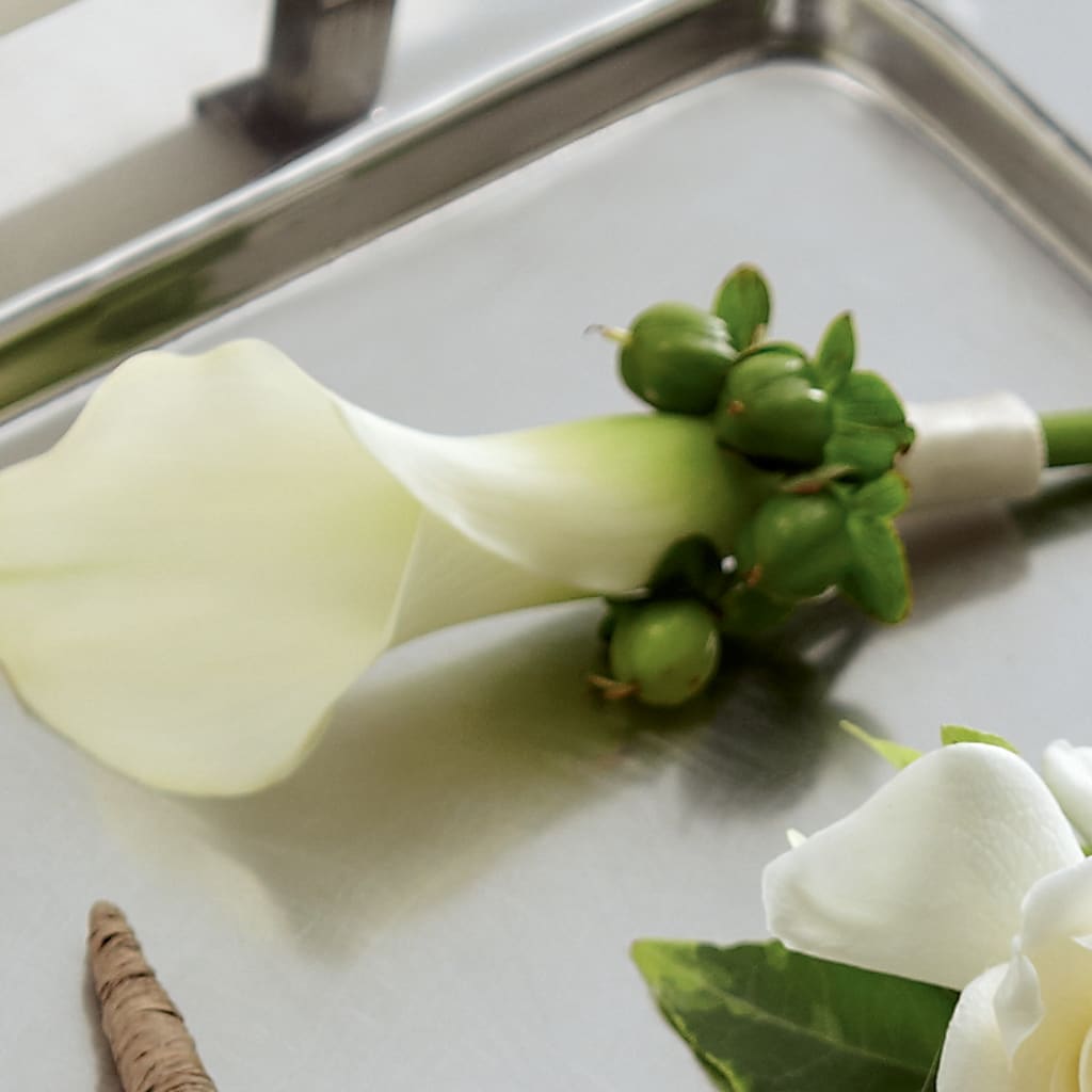 White Calla Boutonniere – Hirzel Brothers Greenhouse, Toledo OH